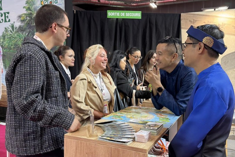 Partners Were Impressed With The Company's New Brochure And Shared Travel Information With Each Other.